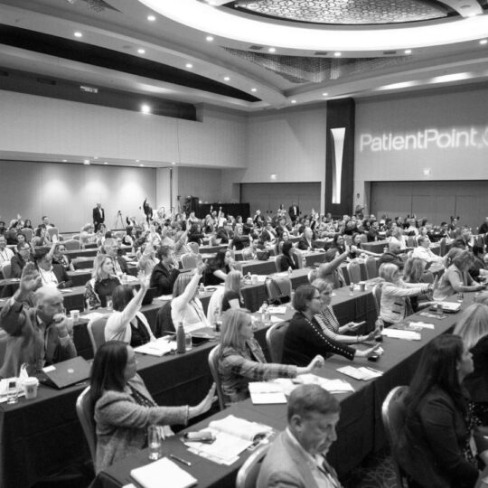 https://www.dtcperspectives.com/wp-content/uploads/2024/07/Engaged-audience-raising-hands_BW-540x540.jpg